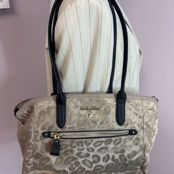 Michael Kors tan and black cheetah print handbag with lots of storage. - Picture 12 of 13